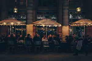 infrared heaters warm up guests sitting on the café patio